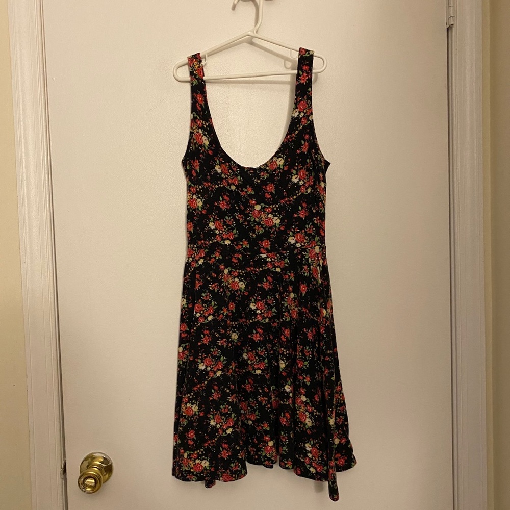 Black flowy top with lip pattern